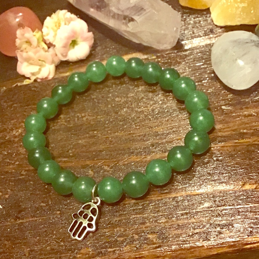 Aventurine bracelet with hamsa charm.